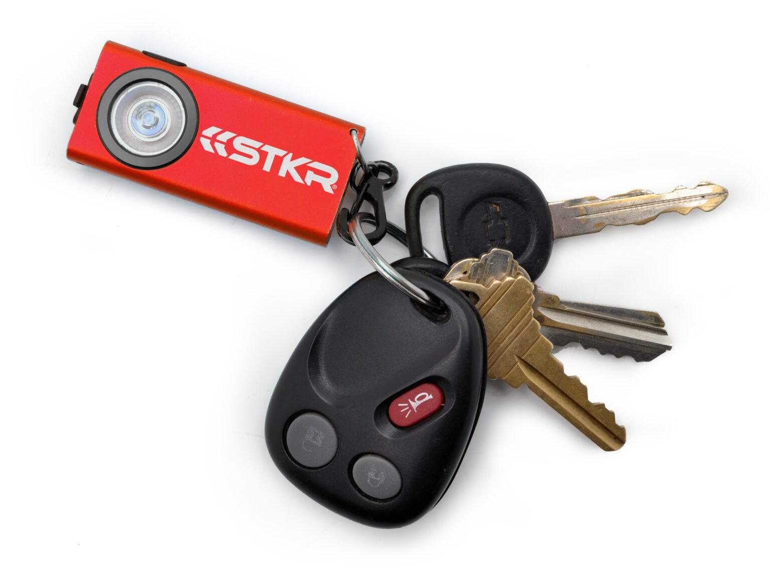 STKR Keychain Flashlight SlimJimmy Red shown attached to a set of truck keys